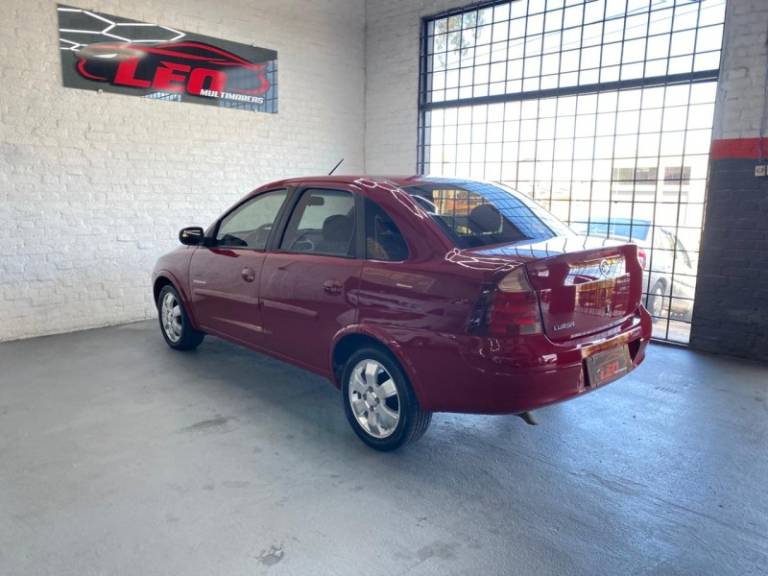 CHEVROLET - CORSA - 2009/2010 - Vermelha - R$ 30.900,00