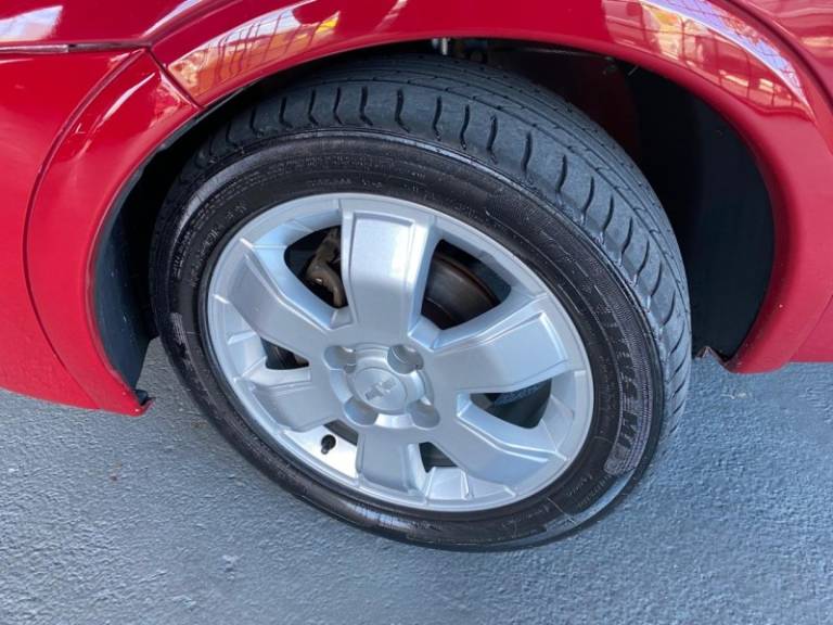 CHEVROLET - CORSA - 2009/2010 - Vermelha - R$ 30.900,00